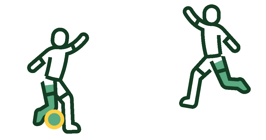 Two people kicking a ball to each other