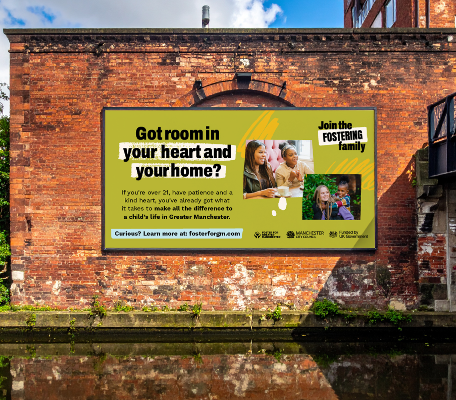 A billboard along a canal for the 'Join the Fostering Family' fostering recruitment campaign.